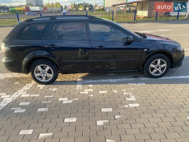 Чорний Мазда 6, об'ємом двигуна 2 л та пробігом 298 тис. км за 4600 $, фото 1 на Automoto.ua