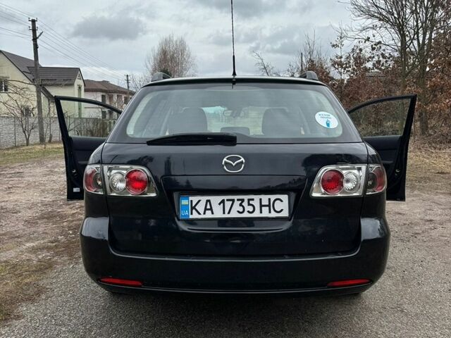 Черный Мазда 6, объемом двигателя 2 л и пробегом 387 тыс. км за 4200 $, фото 1 на Automoto.ua