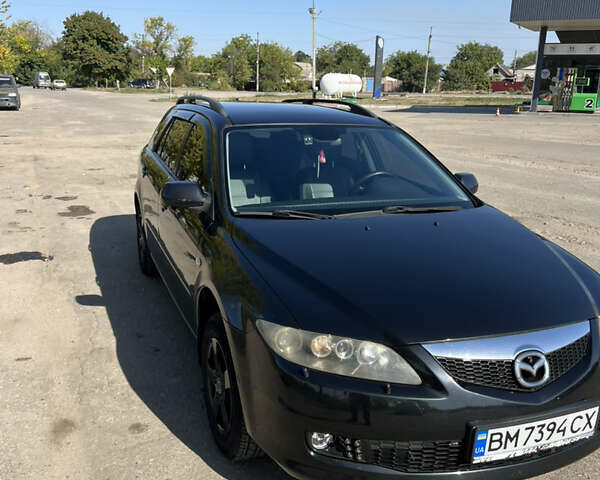 Черный Мазда 6, объемом двигателя 2 л и пробегом 230 тыс. км за 7200 $, фото 1 на Automoto.ua
