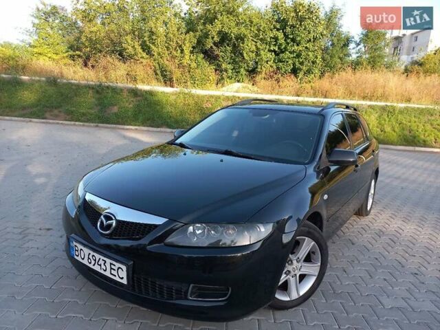 Черный Мазда 6, объемом двигателя 2 л и пробегом 221 тыс. км за 4300 $, фото 1 на Automoto.ua
