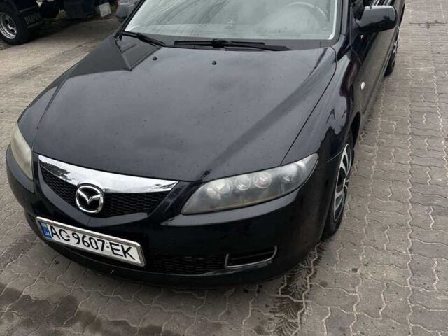 Черный Мазда 6, объемом двигателя 2 л и пробегом 240 тыс. км за 4900 $, фото 1 на Automoto.ua