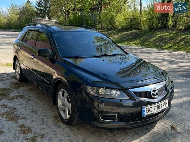 Черный Мазда 6, объемом двигателя 2 л и пробегом 380 тыс. км за 2950 $, фото 1 на Automoto.ua