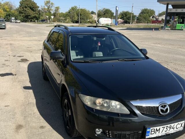 Черный Мазда 6, объемом двигателя 2 л и пробегом 225 тыс. км за 7200 $, фото 1 на Automoto.ua