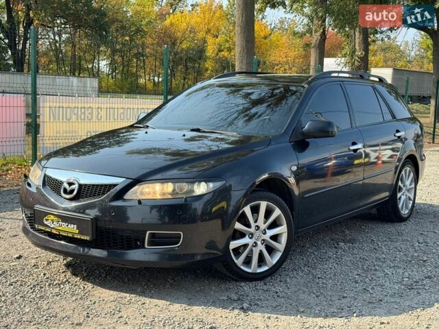 Черный Мазда 6, объемом двигателя 2.3 л и пробегом 221 тыс. км за 5500 $, фото 1 на Automoto.ua