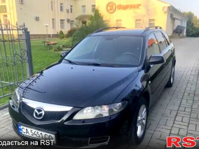 Черный Мазда 6, объемом двигателя 2 л и пробегом 220 тыс. км за 3650 $, фото 1 на Automoto.ua
