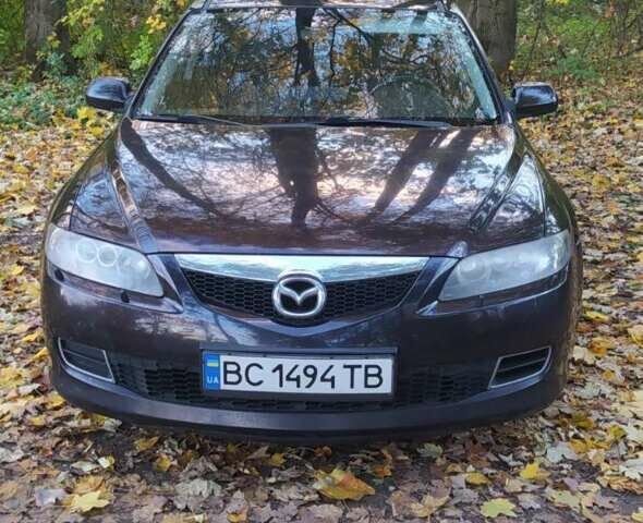 Черный Мазда 6, объемом двигателя 2 л и пробегом 240 тыс. км за 4900 $, фото 1 на Automoto.ua