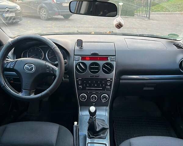 Черный Мазда 6, объемом двигателя 2 л и пробегом 344 тыс. км за 2900 $, фото 1 на Automoto.ua