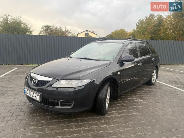 Черный Мазда 6, объемом двигателя 2 л и пробегом 258 тыс. км за 5300 $, фото 1 на Automoto.ua