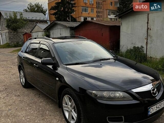 Черный Мазда 6, объемом двигателя 2 л и пробегом 250 тыс. км за 4899 $, фото 1 на Automoto.ua