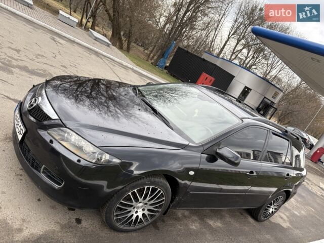 Черный Мазда 6, объемом двигателя 2 л и пробегом 262 тыс. км за 5200 $, фото 1 на Automoto.ua