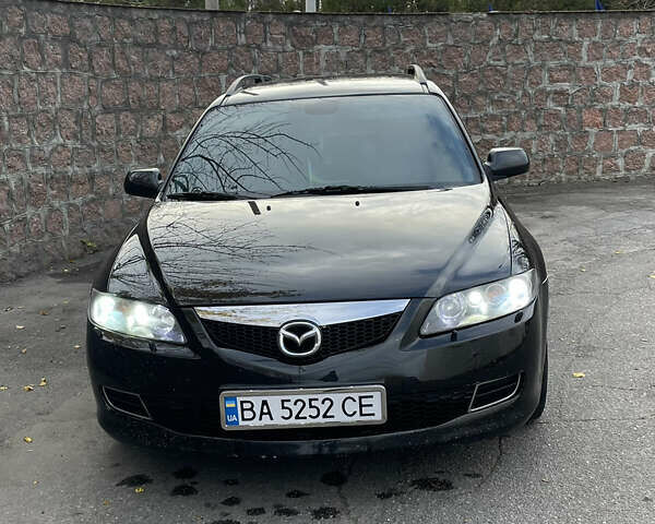Черный Мазда 6, объемом двигателя 1.8 л и пробегом 251 тыс. км за 6200 $, фото 1 на Automoto.ua