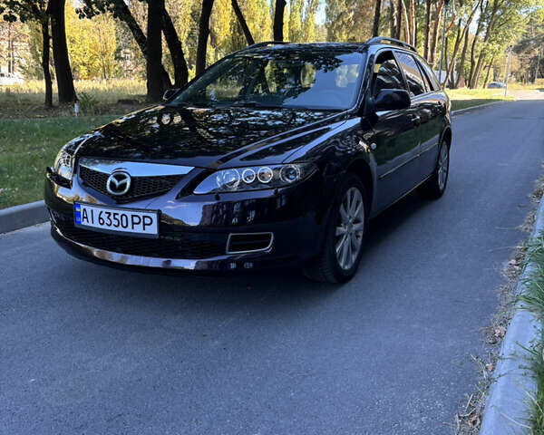 Черный Мазда 6, объемом двигателя 2.3 л и пробегом 201 тыс. км за 5700 $, фото 1 на Automoto.ua