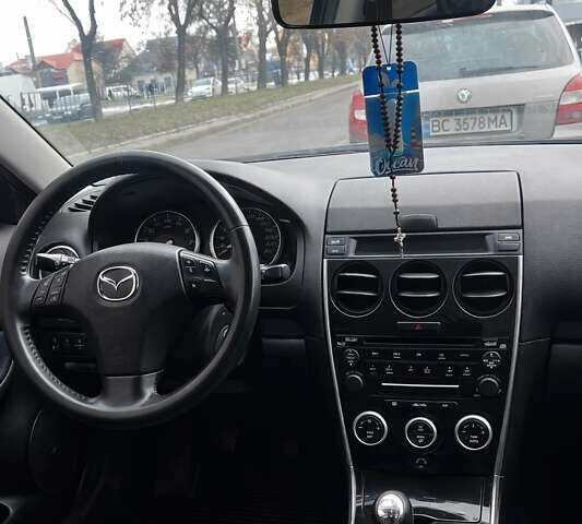 Черный Мазда 6, объемом двигателя 2 л и пробегом 239 тыс. км за 3500 $, фото 1 на Automoto.ua