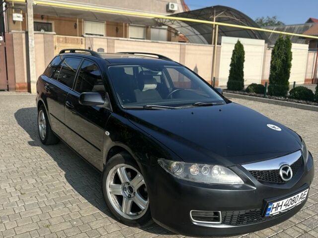 Черный Мазда 6, объемом двигателя 2 л и пробегом 240 тыс. км за 4250 $, фото 1 на Automoto.ua