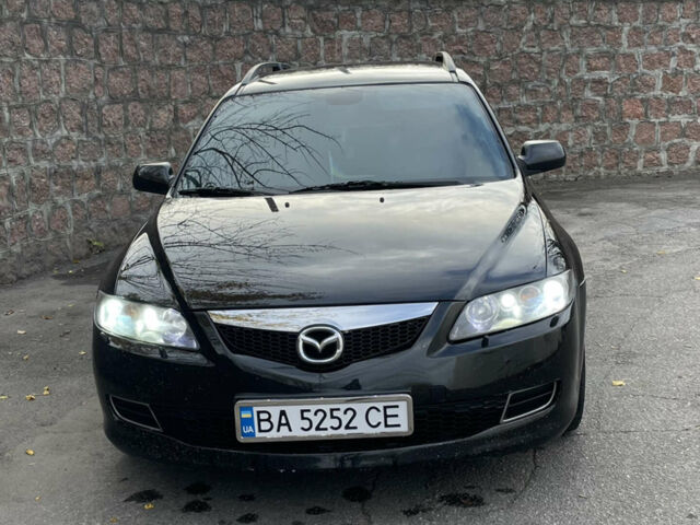 Черный Мазда 6, объемом двигателя 1.8 л и пробегом 272 тыс. км за 5000 $, фото 1 на Automoto.ua