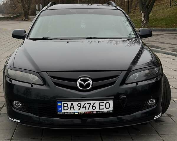 Черный Мазда 6, объемом двигателя 2 л и пробегом 319 тыс. км за 6300 $, фото 1 на Automoto.ua