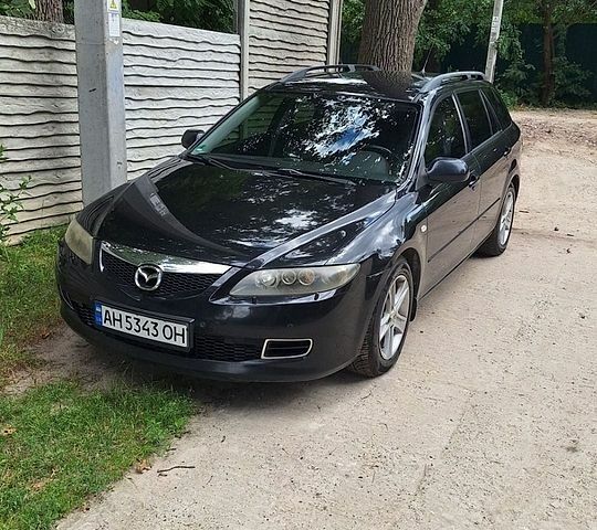 Черный Мазда 6, объемом двигателя 2 л и пробегом 200 тыс. км за 5500 $, фото 1 на Automoto.ua