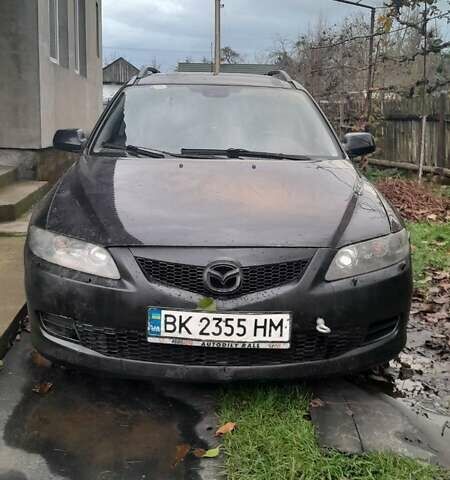 Чорний Мазда 6, об'ємом двигуна 2 л та пробігом 445 тис. км за 2400 $, фото 1 на Automoto.ua