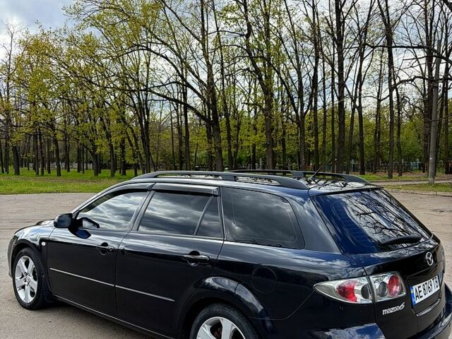 Черный Мазда 6, объемом двигателя 2 л и пробегом 246 тыс. км за 5700 $, фото 1 на Automoto.ua