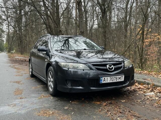 Черный Мазда 6, объемом двигателя 2.3 л и пробегом 293 тыс. км за 5300 $, фото 1 на Automoto.ua