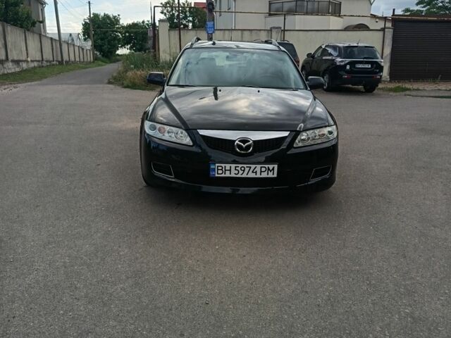 Черный Мазда 6, объемом двигателя 2 л и пробегом 304 тыс. км за 2902 $, фото 1 на Automoto.ua