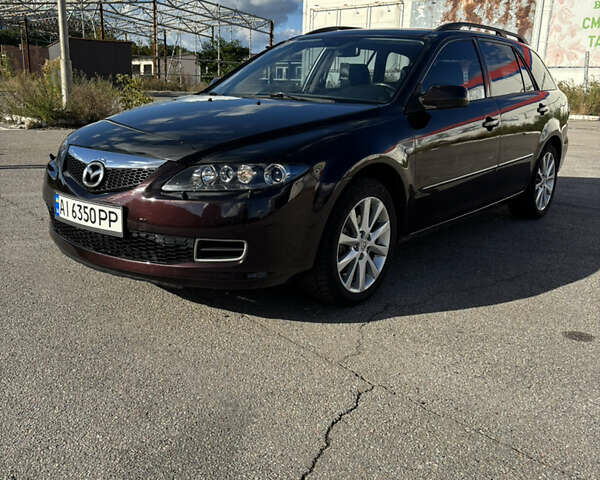 Черный Мазда 6, объемом двигателя 2.3 л и пробегом 202 тыс. км за 5250 $, фото 1 на Automoto.ua
