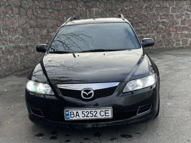 Черный Мазда 6, объемом двигателя 1.8 л и пробегом 262 тыс. км за 5000 $, фото 1 на Automoto.ua