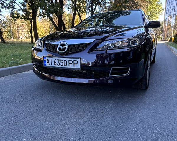 Черный Мазда 6, объемом двигателя 2.3 л и пробегом 202 тыс. км за 5100 $, фото 1 на Automoto.ua