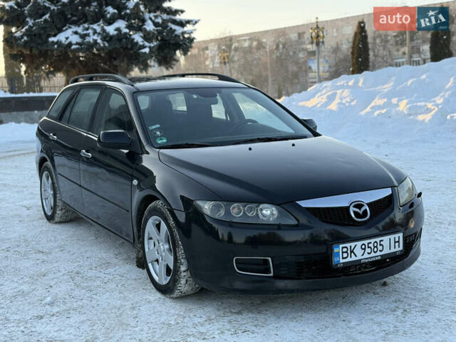 Черный Мазда 6, объемом двигателя 2 л и пробегом 250 тыс. км за 3300 $, фото 1 на Automoto.ua