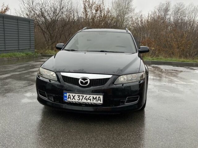 Черный Мазда 6, объемом двигателя 2 л и пробегом 140 тыс. км за 5700 $, фото 1 на Automoto.ua
