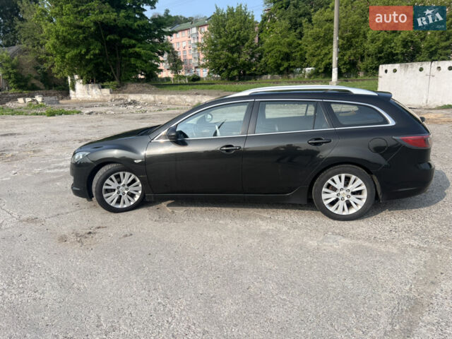 Черный Мазда 6, объемом двигателя 2 л и пробегом 252 тыс. км за 6500 $, фото 1 на Automoto.ua