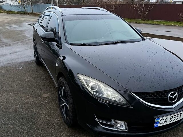Черный Мазда 6, объемом двигателя 2 л и пробегом 300 тыс. км за 7000 $, фото 1 на Automoto.ua