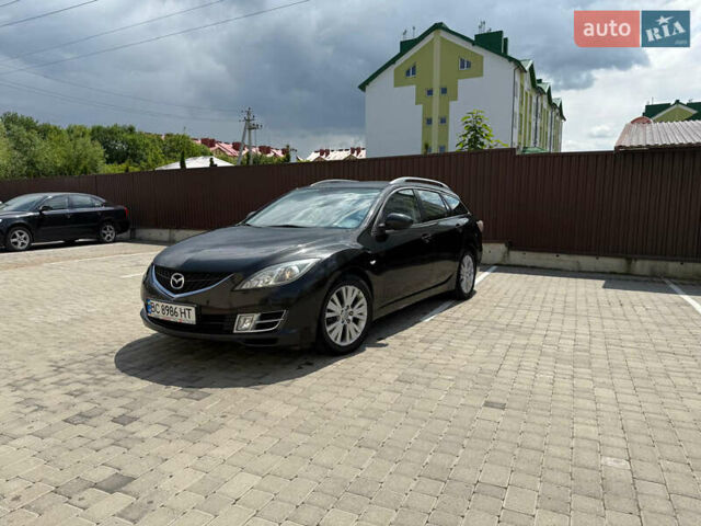 Черный Мазда 6, объемом двигателя 2 л и пробегом 232 тыс. км за 6600 $, фото 1 на Automoto.ua
