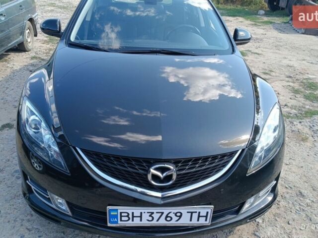 Черный Мазда 6, объемом двигателя 2 л и пробегом 247 тыс. км за 7501 $, фото 1 на Automoto.ua