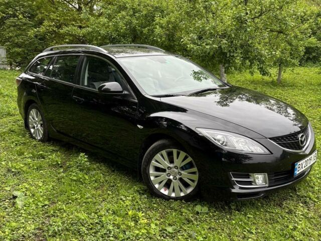 Черный Мазда 6, объемом двигателя 2 л и пробегом 210 тыс. км за 8500 $, фото 1 на Automoto.ua
