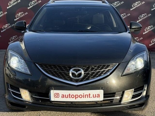 Черный Мазда 6, объемом двигателя 2 л и пробегом 321 тыс. км за 6000 $, фото 1 на Automoto.ua