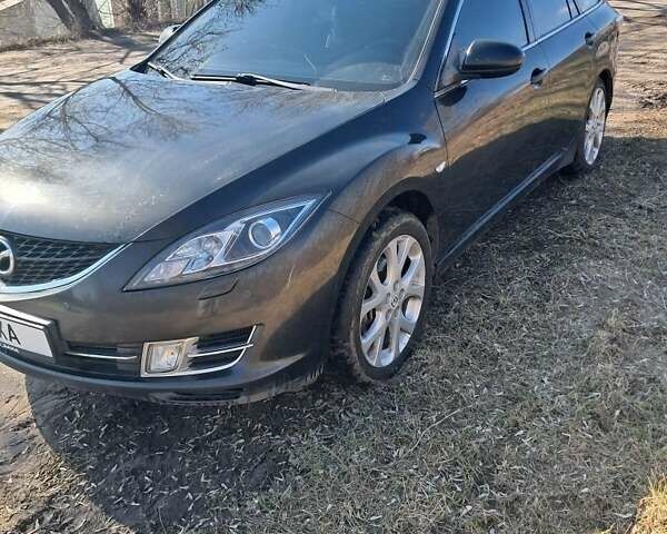 Черный Мазда 6, объемом двигателя 2 л и пробегом 320 тыс. км за 6900 $, фото 1 на Automoto.ua