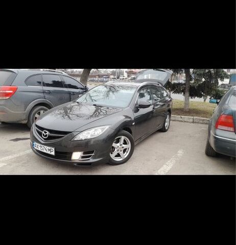 Черный Мазда 6, объемом двигателя 2 л и пробегом 300 тыс. км за 5200 $, фото 1 на Automoto.ua