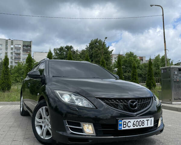 Чорний Мазда 6, об'ємом двигуна 2 л та пробігом 216 тис. км за 6646 $, фото 1 на Automoto.ua