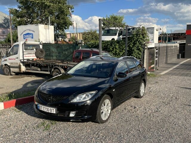Черный Мазда 6, объемом двигателя 2 л и пробегом 314 тыс. км за 5600 $, фото 1 на Automoto.ua
