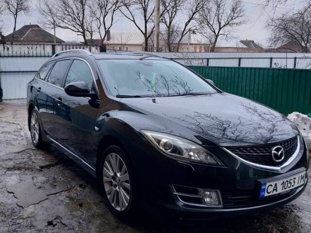 Черный Мазда 6, объемом двигателя 1.8 л и пробегом 300 тыс. км за 6000 $, фото 1 на Automoto.ua