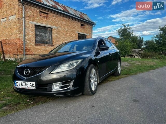 Черный Мазда 6, объемом двигателя 2 л и пробегом 246 тыс. км за 5500 $, фото 1 на Automoto.ua