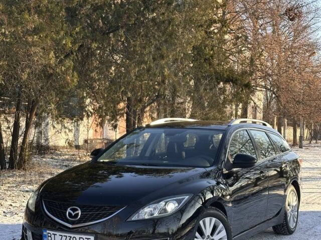 Черный Мазда 6, объемом двигателя 2 л и пробегом 310 тыс. км за 6000 $, фото 1 на Automoto.ua