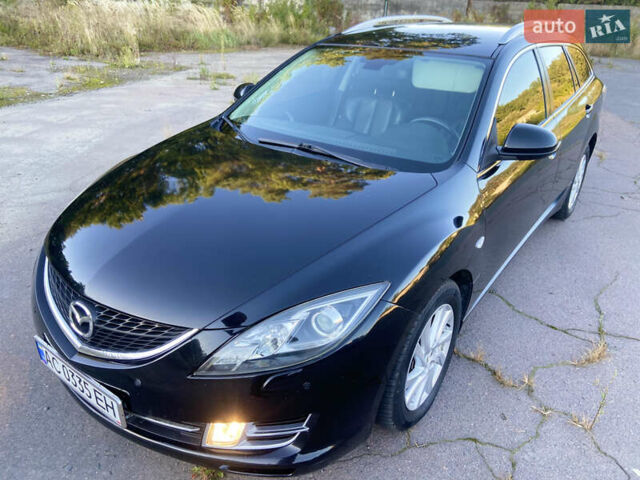Черный Мазда 6, объемом двигателя 2 л и пробегом 287 тыс. км за 6299 $, фото 1 на Automoto.ua