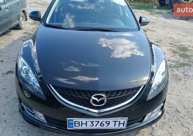 Чорний Мазда 6, об'ємом двигуна 2 л та пробігом 247 тис. км за 7501 $, фото 1 на Automoto.ua