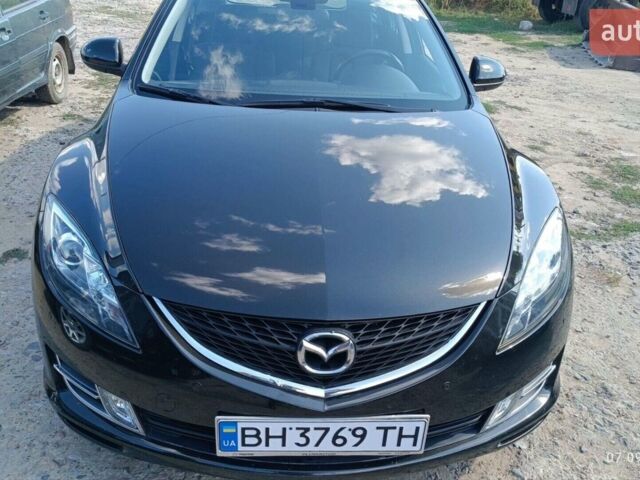 Черный Мазда 6, объемом двигателя 2 л и пробегом 247 тыс. км за 7501 $, фото 1 на Automoto.ua
