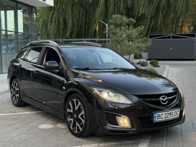 Черный Мазда 6, объемом двигателя 2.2 л и пробегом 297 тыс. км за 6425 $, фото 1 на Automoto.ua