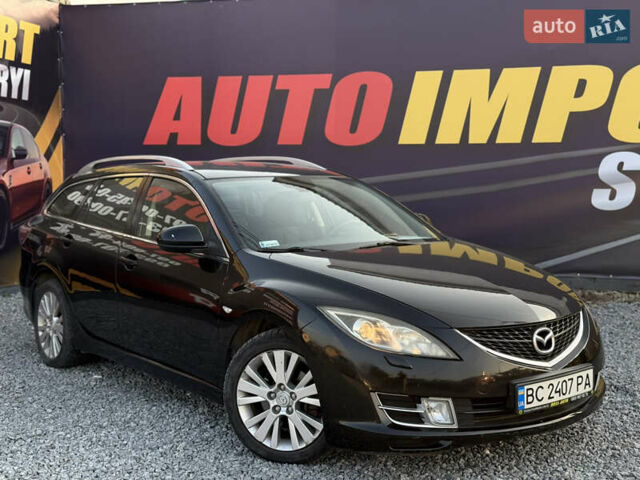 Черный Мазда 6, объемом двигателя 2 л и пробегом 306 тыс. км за 5899 $, фото 1 на Automoto.ua