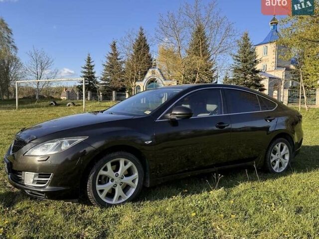 Черный Мазда 6, объемом двигателя 2 л и пробегом 310 тыс. км за 6800 $, фото 1 на Automoto.ua