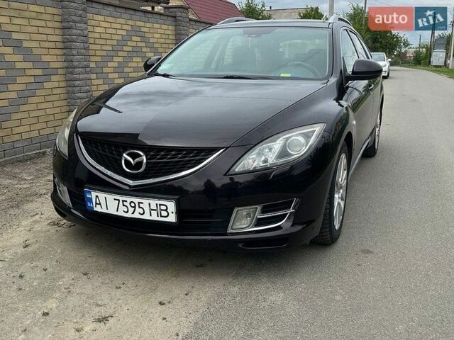 Черный Мазда 6, объемом двигателя 2 л и пробегом 175 тыс. км за 7200 $, фото 1 на Automoto.ua